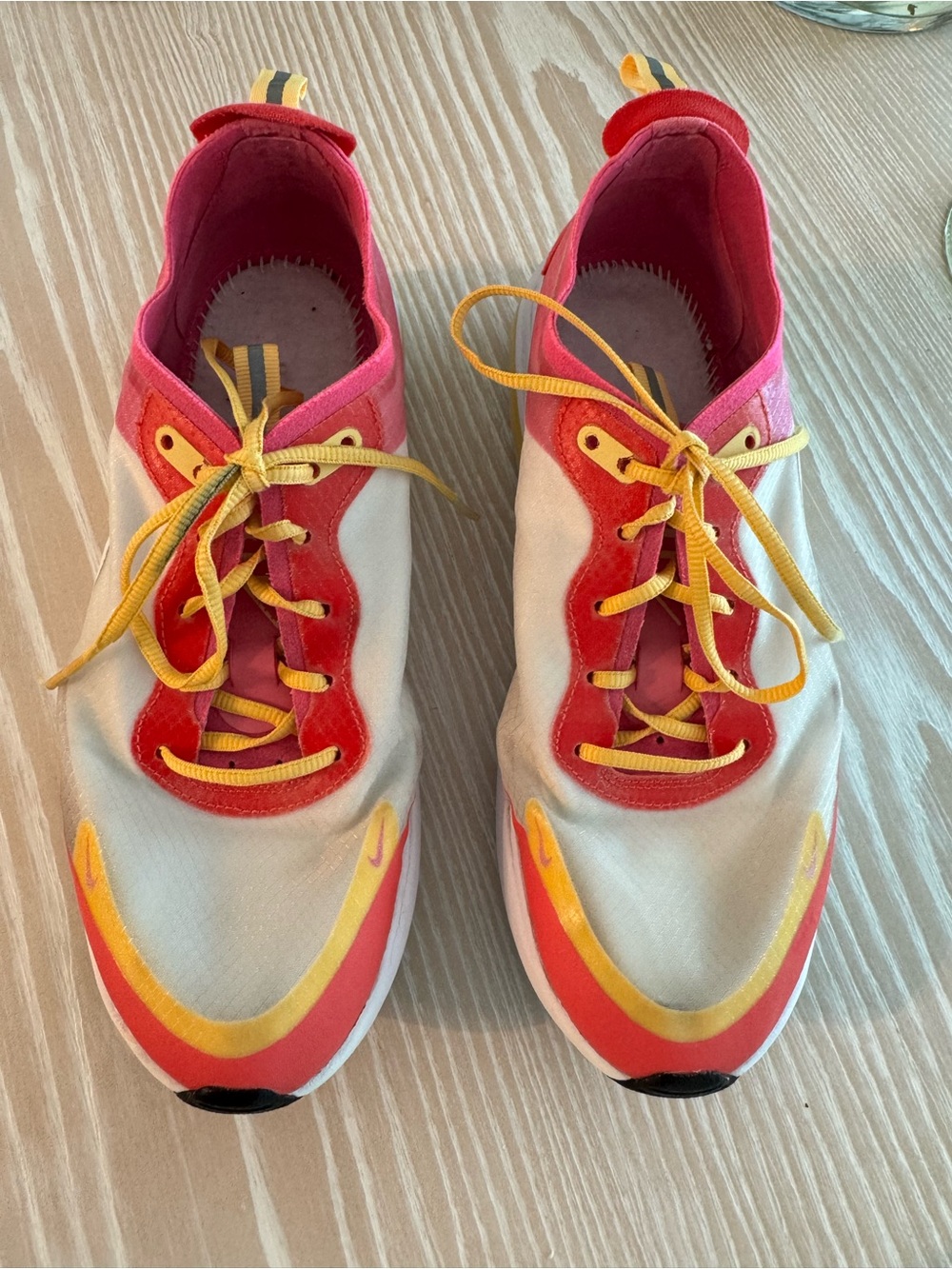 Nike Women’s Athletic Sneakers in pink , Yellow, and white